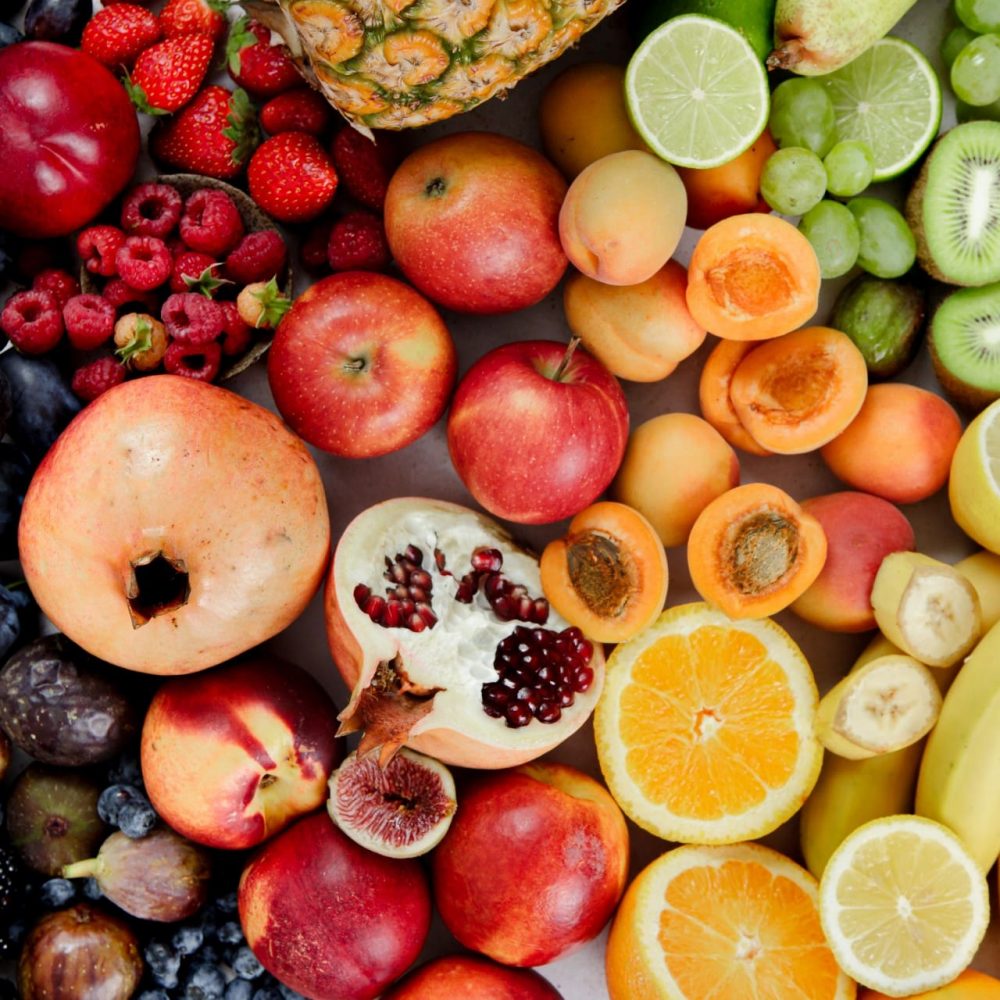 Colorful raw fruits together. Full frame of assortment of healthy and fresh fruits.